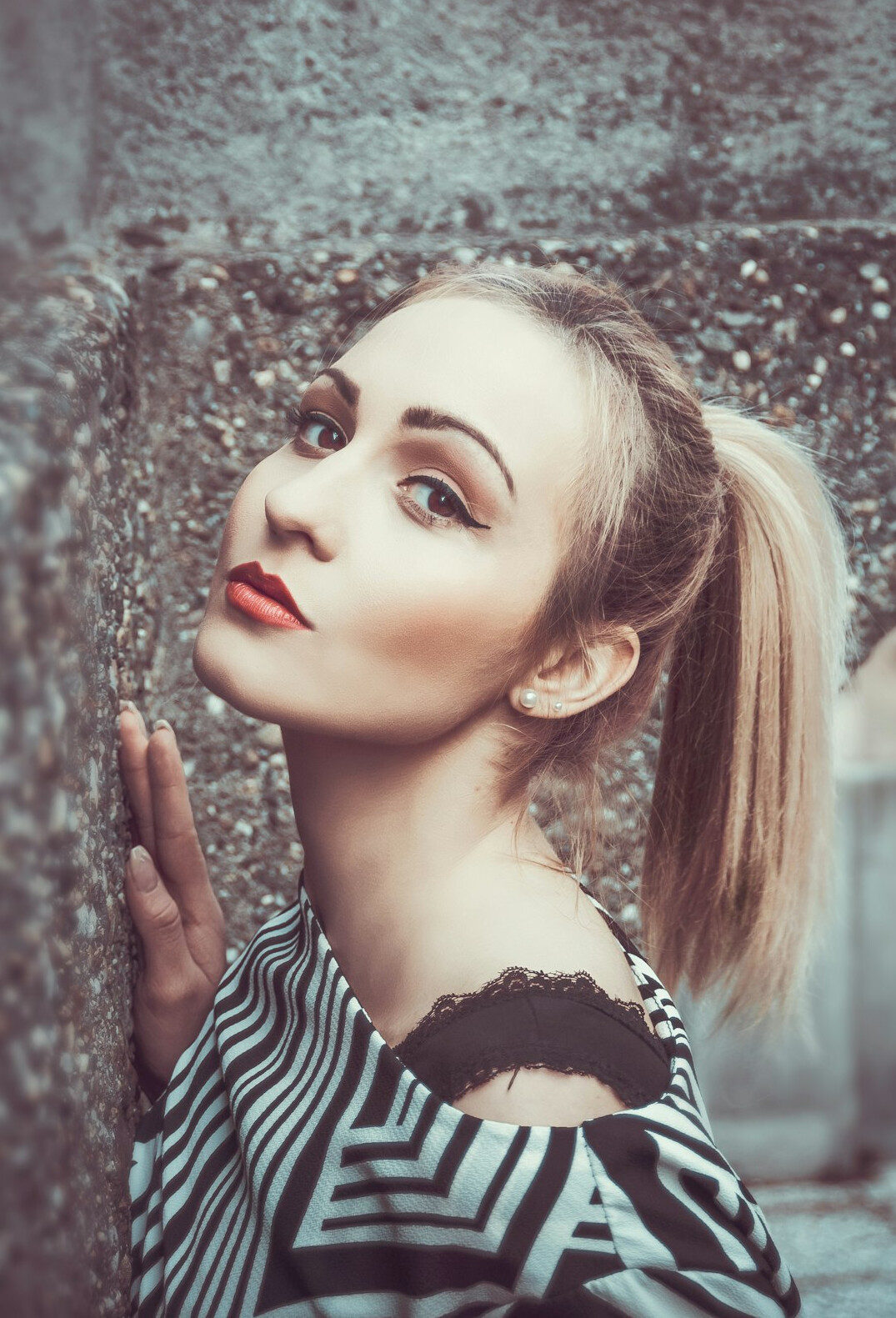 Portrait of a young woman fact checker with a ponytail