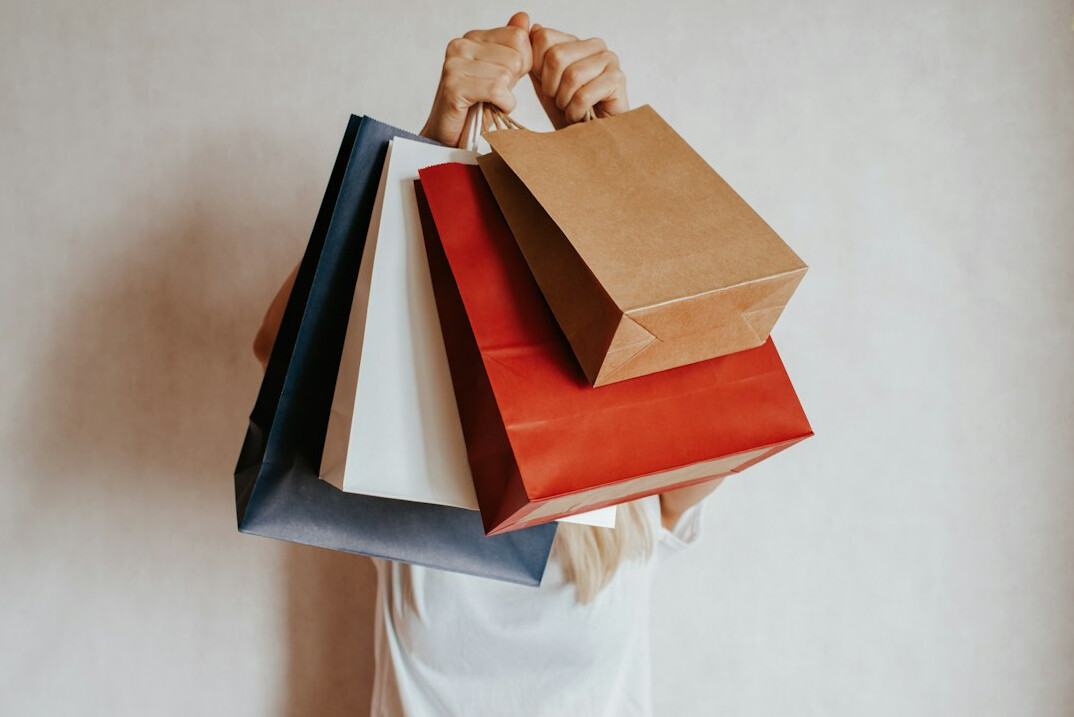 person hiding item in bag