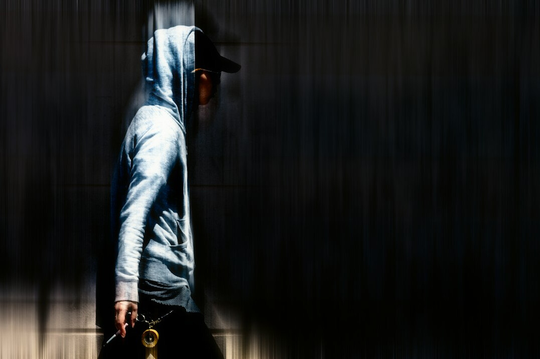 store detective chasing thief