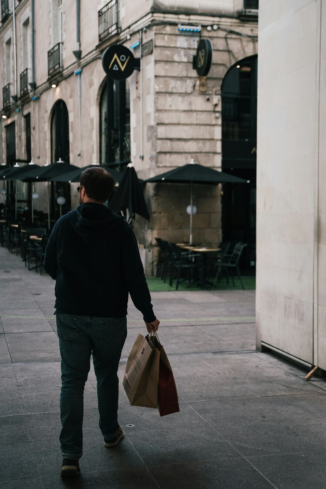 man with shopping bags