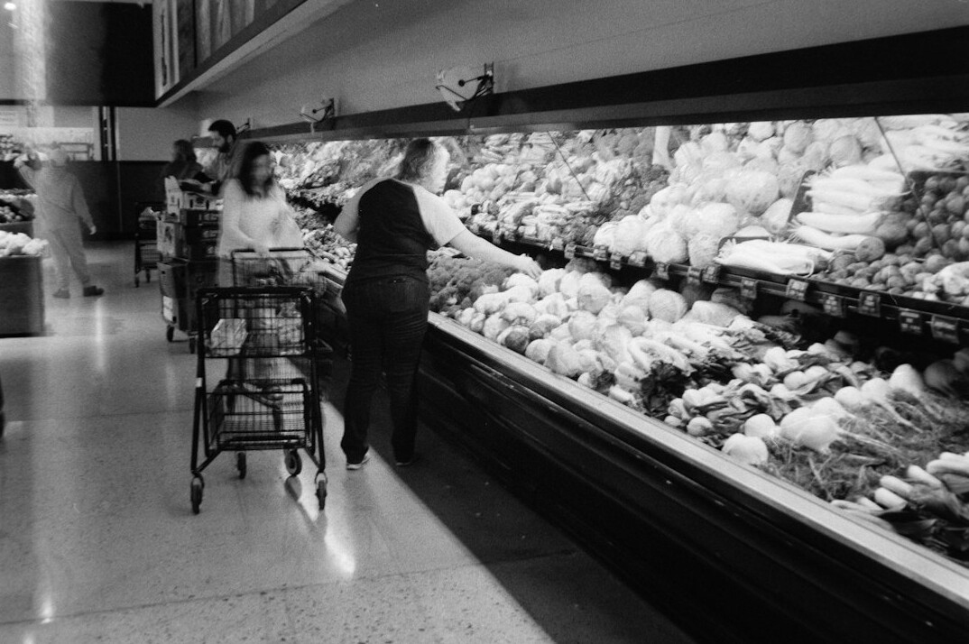 suspicious shopper in aisle